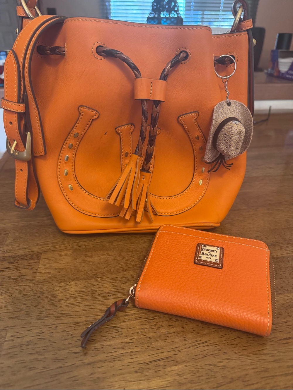 Used Dooney & Bourke Orange Western drawstring bag bundle.